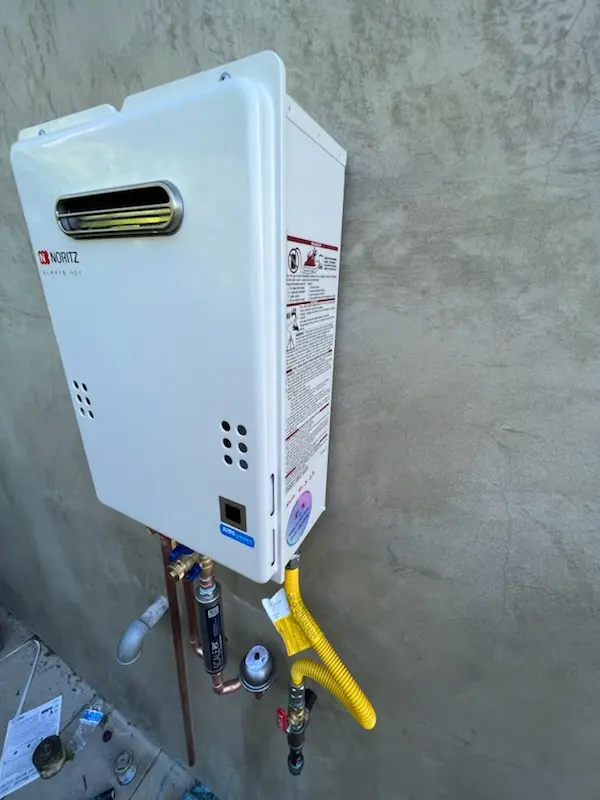 Tankless water heater installation for Bush Addition homes